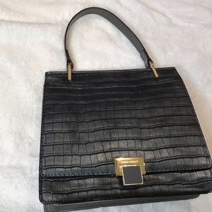 Black leather bag.